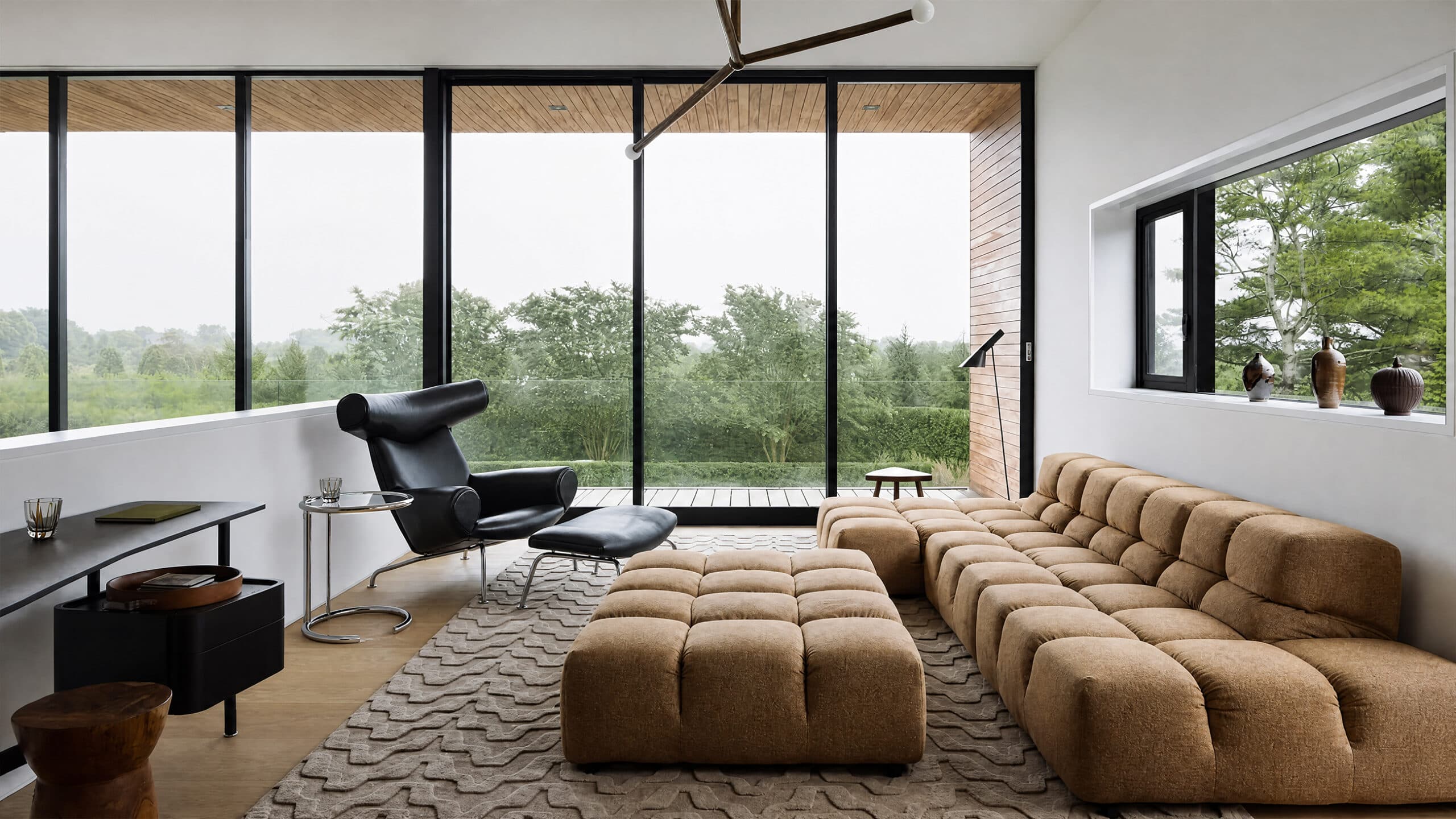 A modern home in zinc and blackened wood styled by Gregory Rockwell