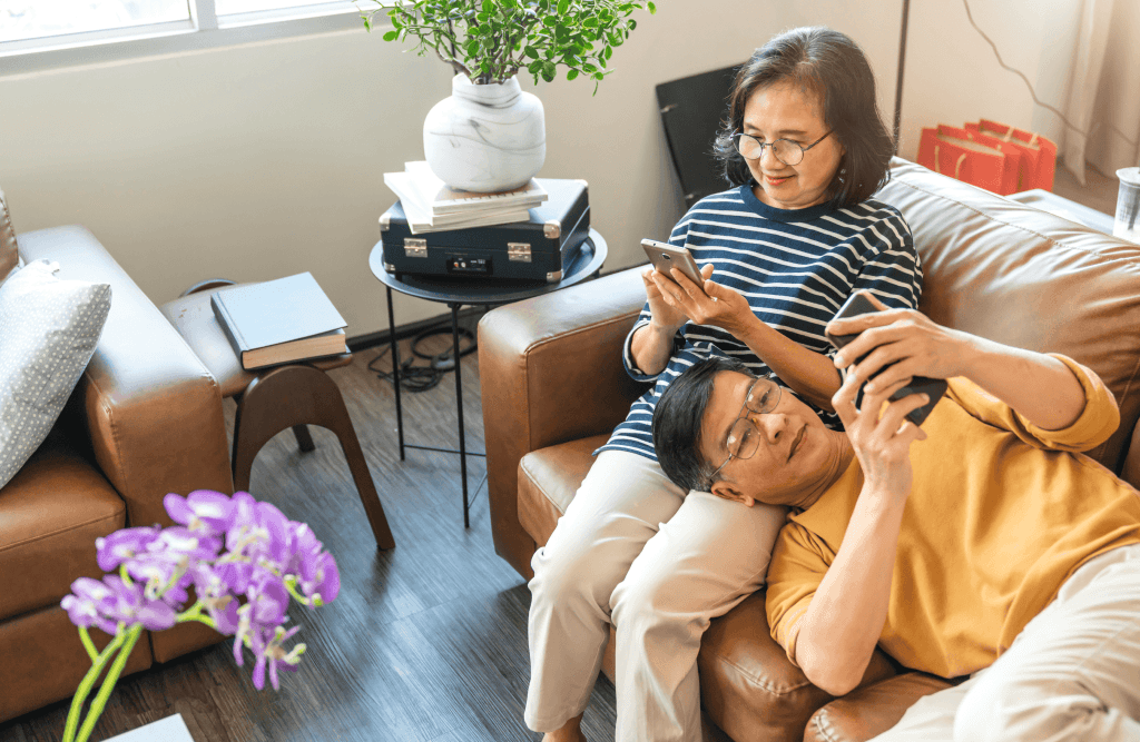 parents, moms and dads on leather sofa