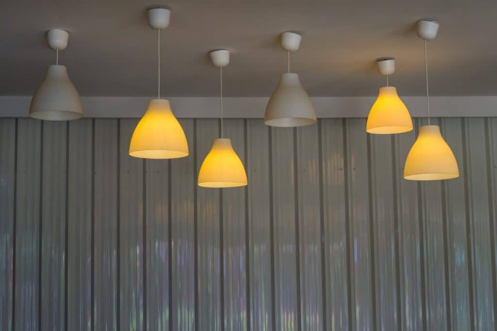 Add string lights or a ceiling light with warm bulbs for a soft glow.
