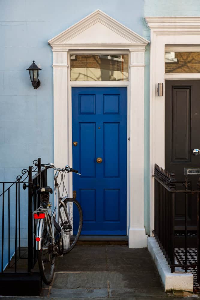 Front view of front door with blue wall