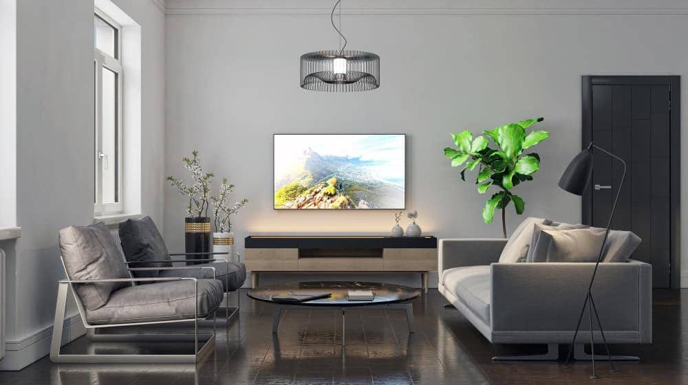 Frame TV displaying artwork in small living room ideas with TV setup that looks elegant and curated.