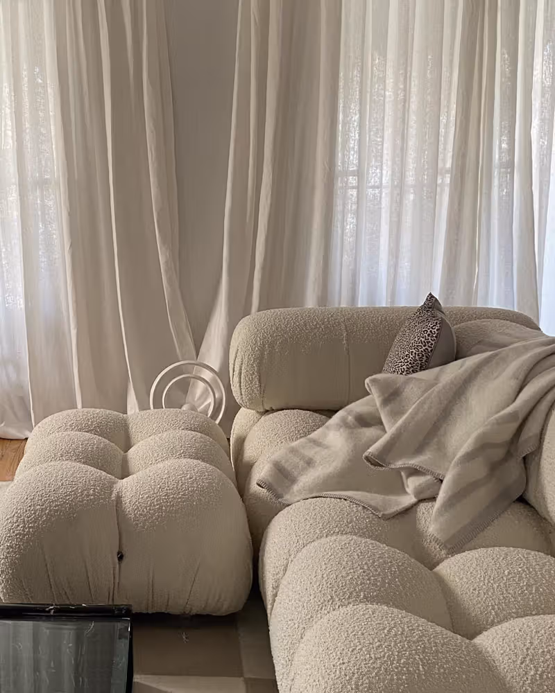 Minimal living room with a neutral home decor color palette, beige sofa, and natural textures that add depth without extra color.