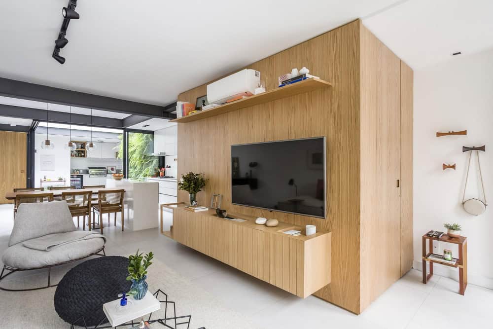 Built-in cabinetry showcasing smart small living room ideas with TV and hidden storage for a clean design.