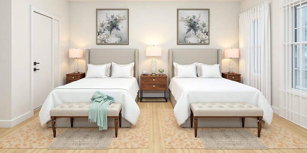 Twin bedroom layout showing rugs and lighting used to separate each bed area while keeping the room balanced and stylish.