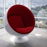 A brightly colored Ball Chair Replica with its distinctive spherical design and comfortable interior, epitomizing mid-century retro-style furniture.