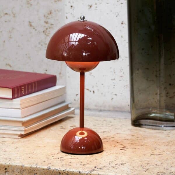 Flamingo Table Lamp features a pink ceramic flamingo base with intricate details and a white lampshade.