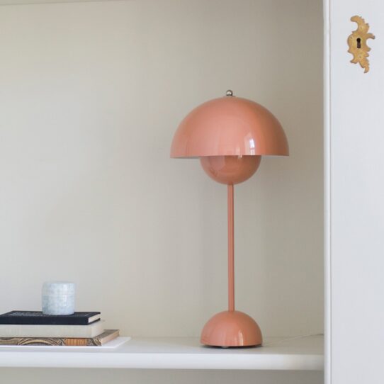 Flamingo Table Lamp has a unique design consisting of two semi-circle spheres facing each other.