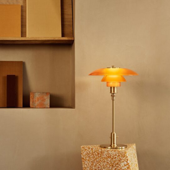 The Pomelo Table Lamp stands approximately 15 inches tall and would make a stylish in any room.