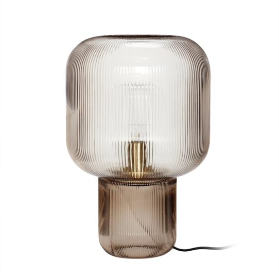 Pomelo Table Lamp with a round, white shade and a slim, curved base made of polished brass.