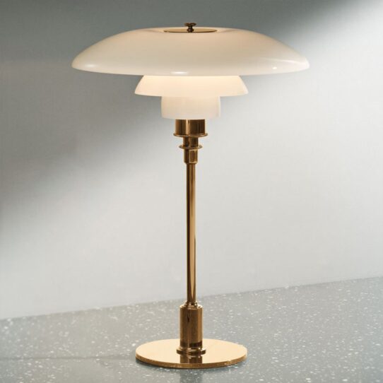 The blend of classic materials gives the Pomelo Table Lamp aesthetic.