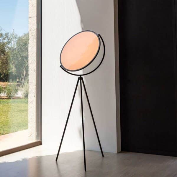 Sohnne Superloon Floor Lamp Replica is circular and flat, resembling a large moon.