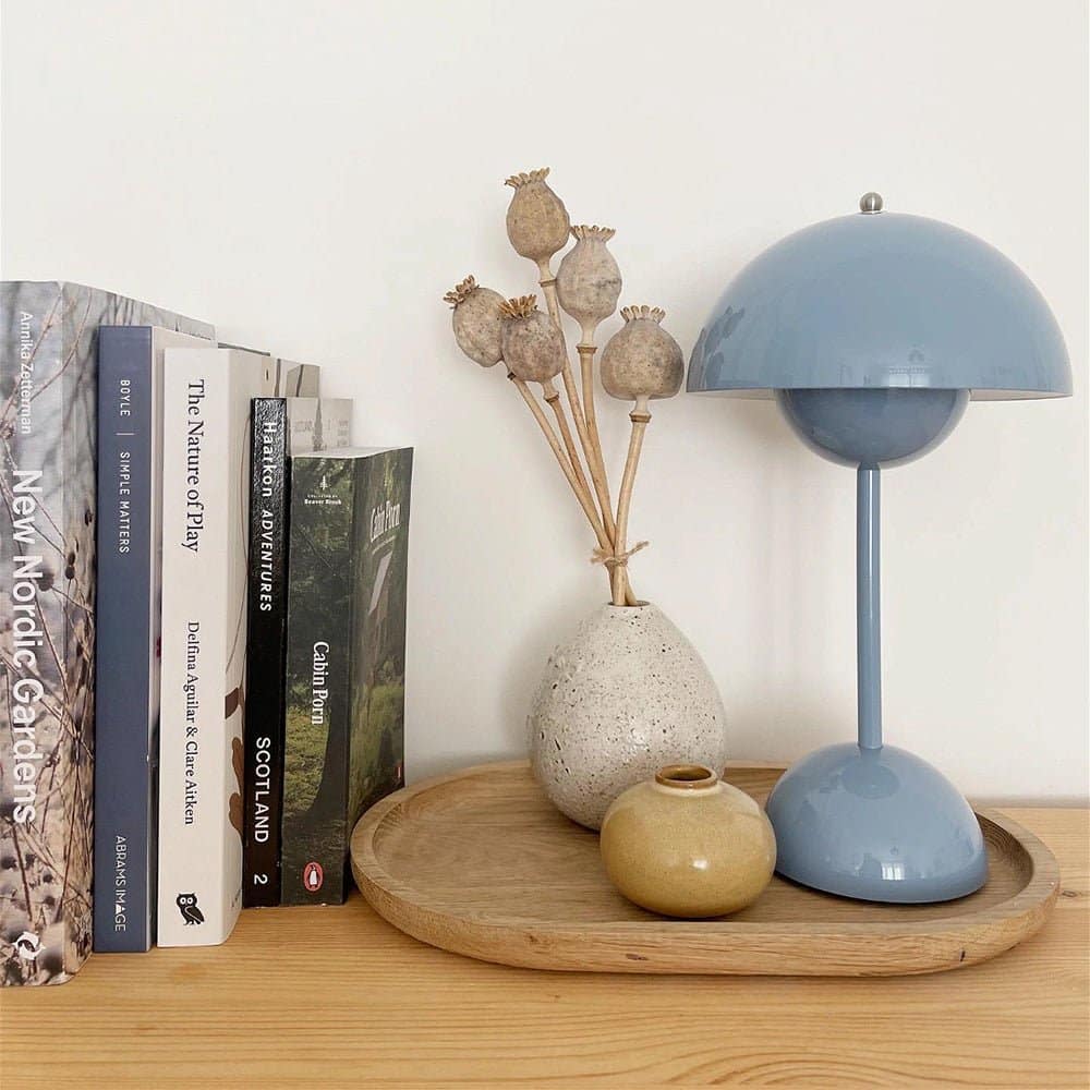 The lamp is a stylish and unique addition to any room decor, adding a playful and tropical touch.