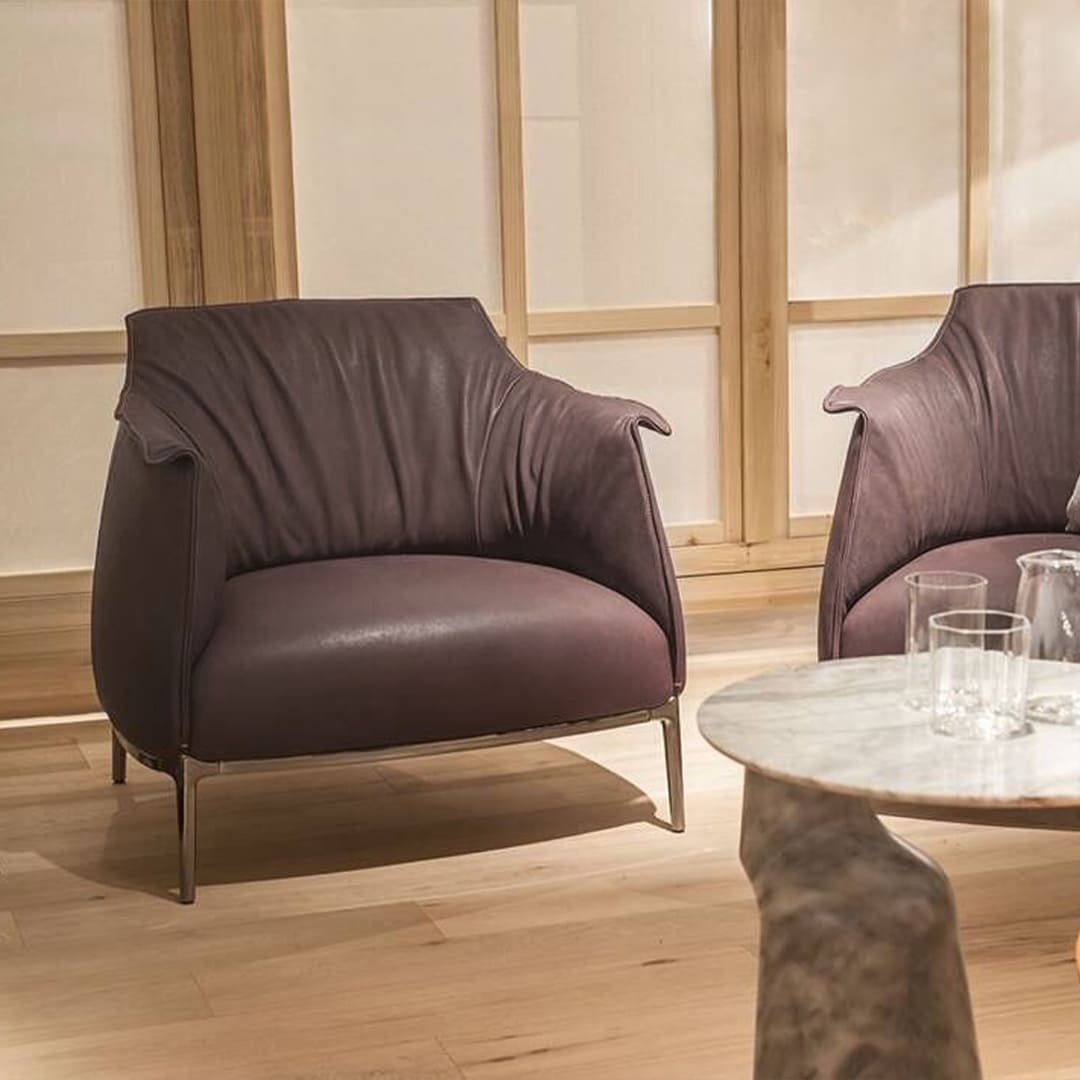 The Archibald Armchair Replica exudes luxury and comfort with its sleek design and premium leather upholstery.
