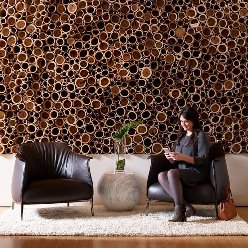 Relax in ultimate comfort with the spacious and plush cushion of the Archibald Armchair Replica, crafted with top-grain leather for superior softness and durability
