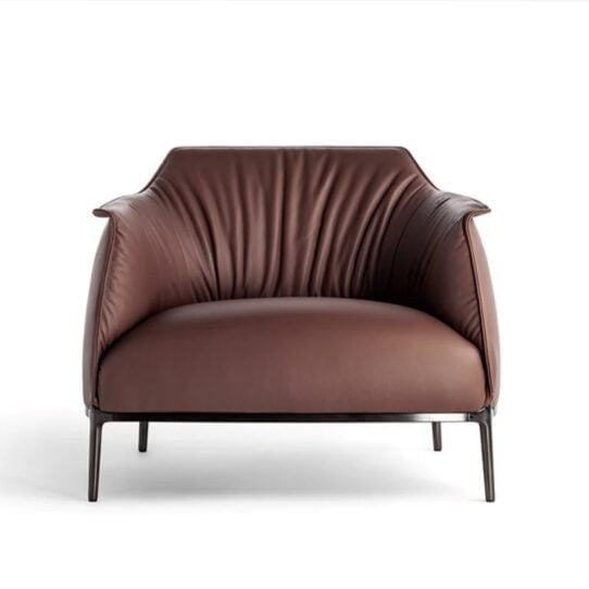 Experience ultimate relaxation with the spacious and plush cushion of the Archibald Armchair Replica, providing excellent support for your body.