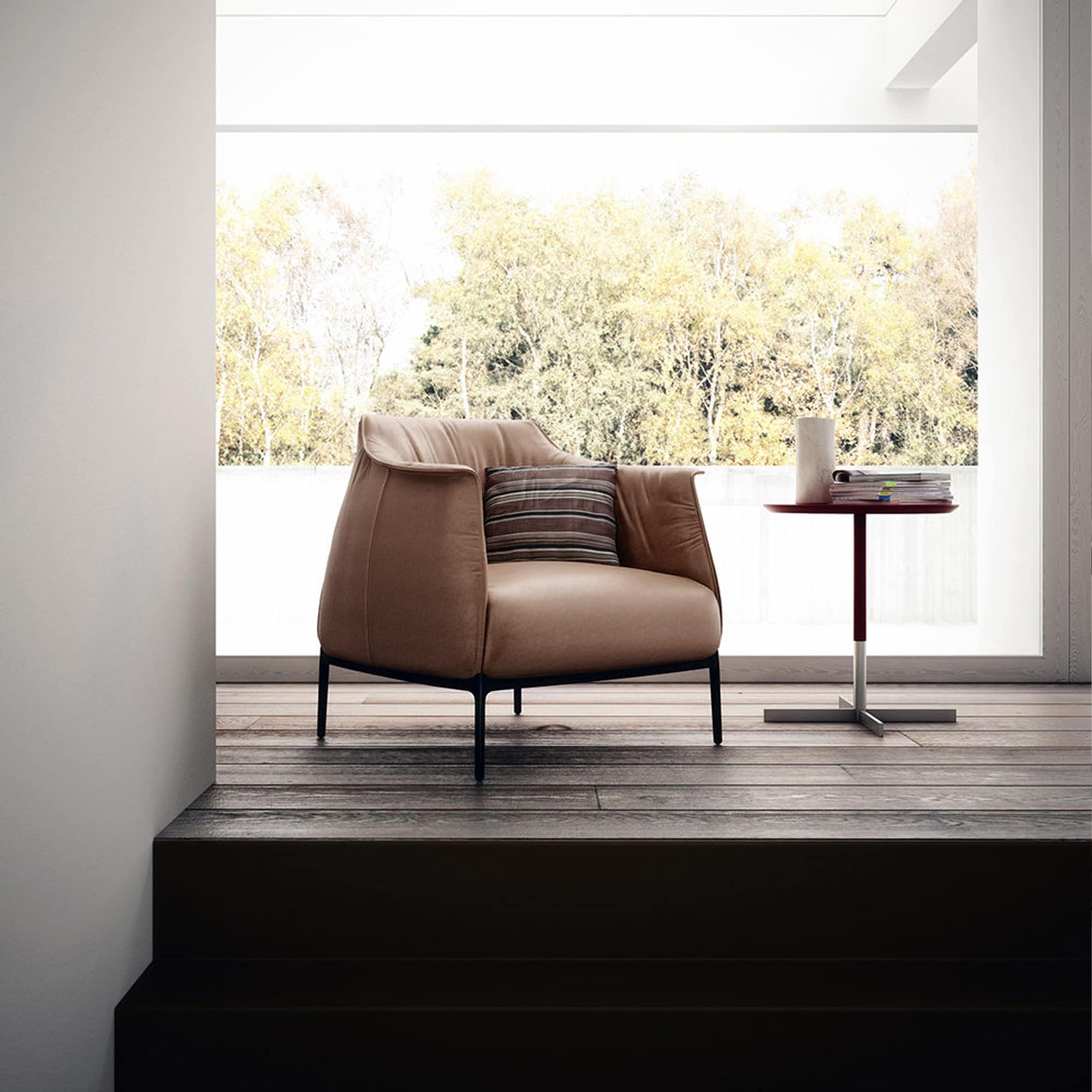 Create a cozy nook with the Archibald Armchair Replica, perfect for relaxing in any open plan or private environment.