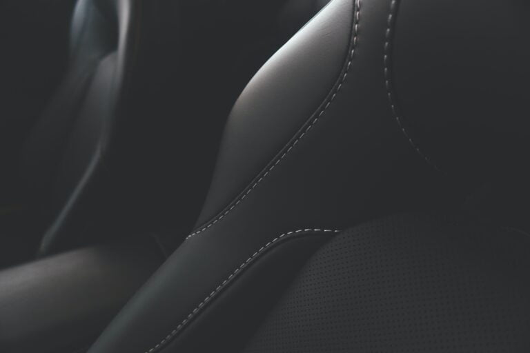 marvin meyer 4Lh 4xE5 Js unsplash scaled - black leather chair