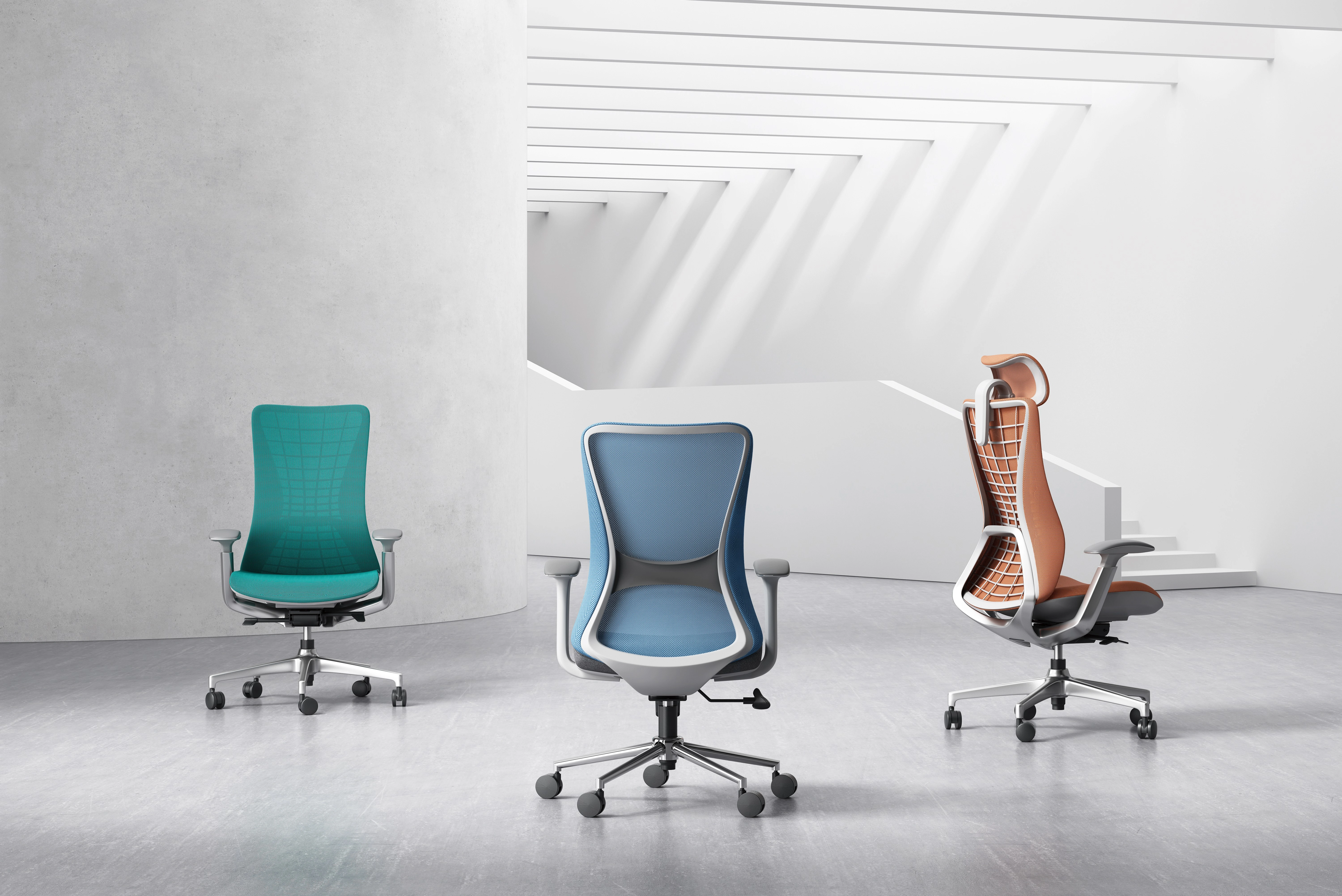 Three ergonomic office chairs in vibrant colors—teal, blue, and orange—displayed in a minimalist workspace with clean lines and a modern design.
