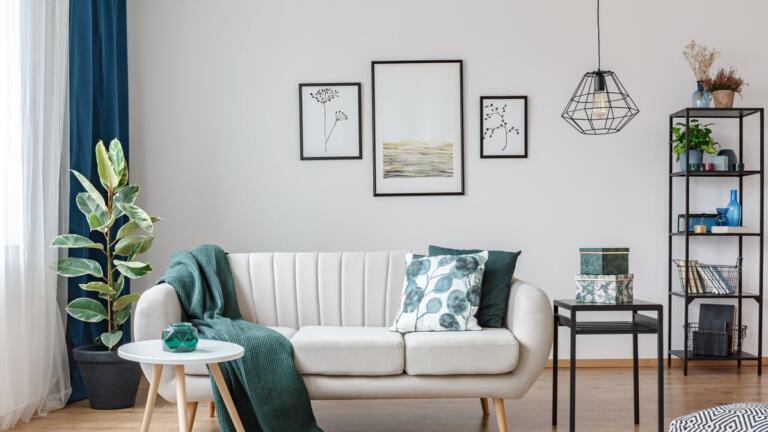 posters in cozy apartment interior royalty free image 943910360 1534189931 - Best comfortable sofa