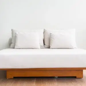 double bed with white pillows - most comfortable futons