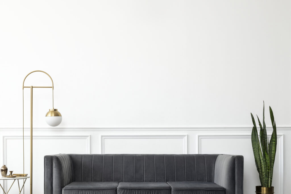 chic mid century modern luxury aesthetics living room with gray velvet couch golden lamp 1 | Sohnne®