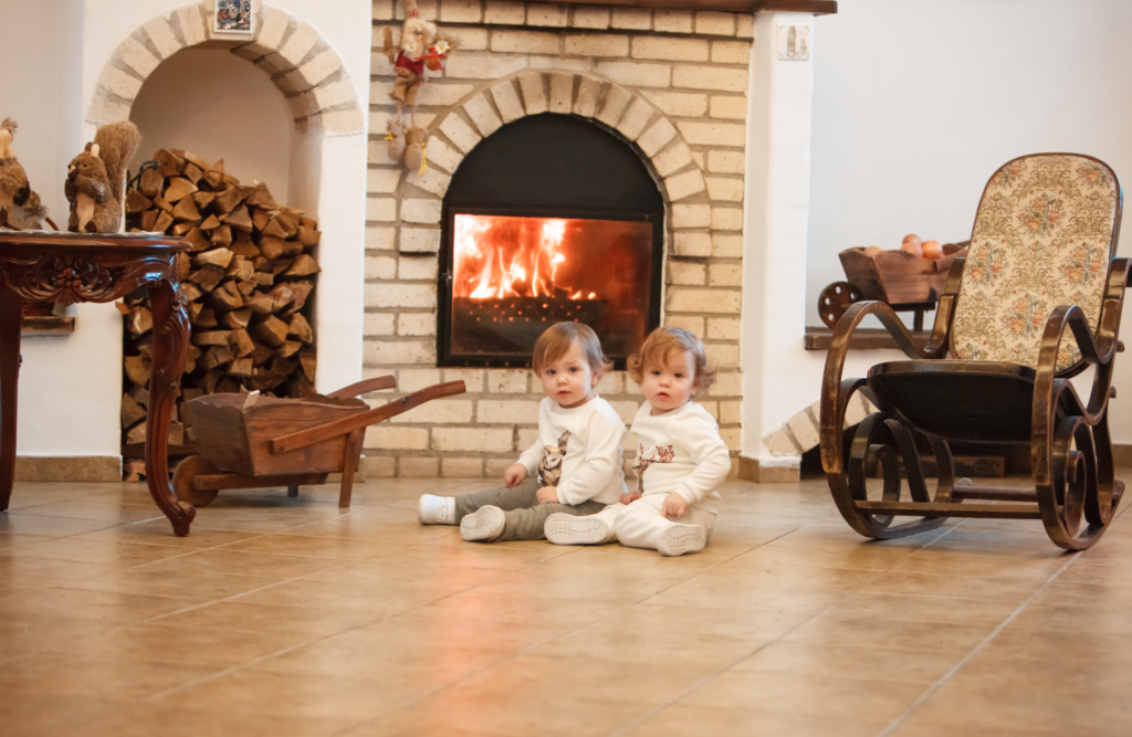Accentuate the Fireplace and two cute children