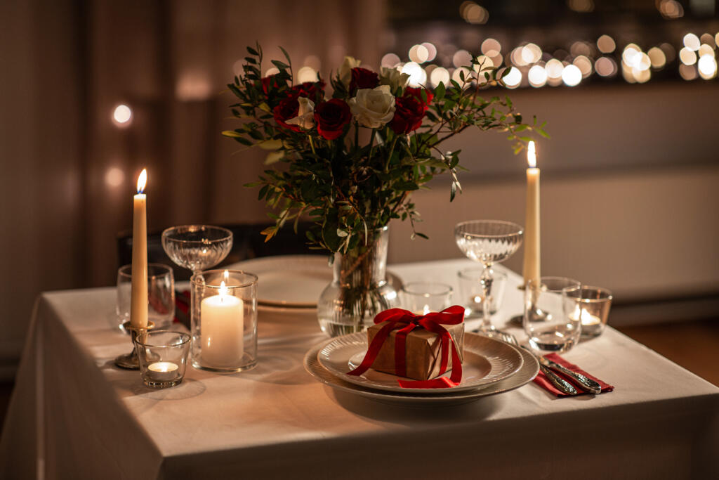 Elegant evening setup with post tags and a gift on top of table