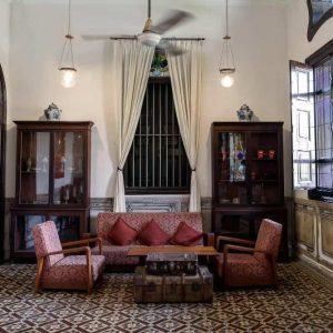 traditional living room examples with traditional furniture, including classic sofa, cabinets, and tables