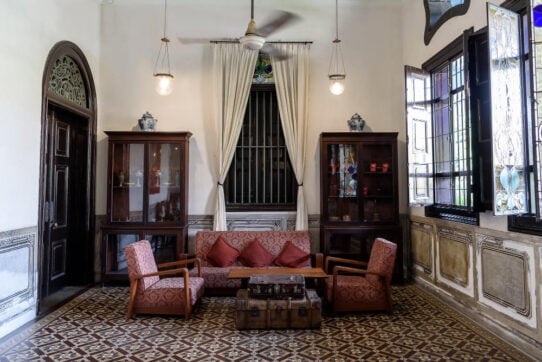traditional living room examples with traditional furniture, including classic sofa, cabinets, and tables