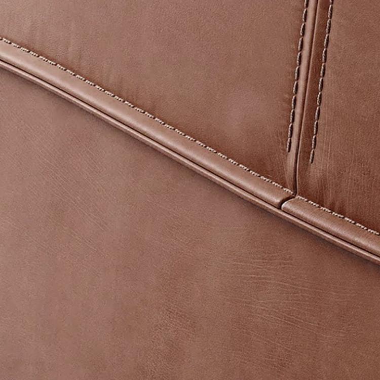 Archibalad Armchair Replica covered with premium leather, perfect for giving your living room the luxury it deserves. With its luxurious good looks, this armchair is like fine wine: only getting better over time!