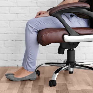 Woman sitting on the office chair indoors