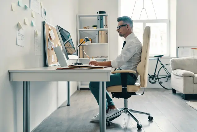 business is his life thoughtful young man shirt tie working using computer while sitting office - office chair for tall people, height, lumbar support, optimal support