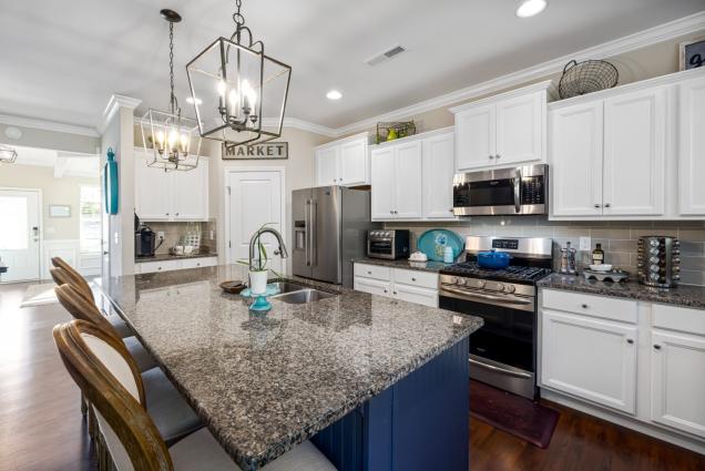 pexels curtis adams 10099106 1 scaled - kitchen island pendant lighting ideas,  kitchen
