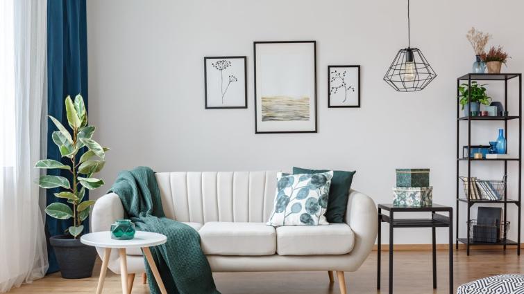 posters in cozy apartment interior royalty free image 943910360 1534189931 - Best comfortable sofa